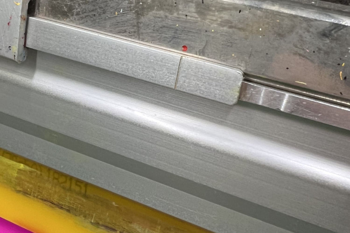 Squeegee & Floodbar Center